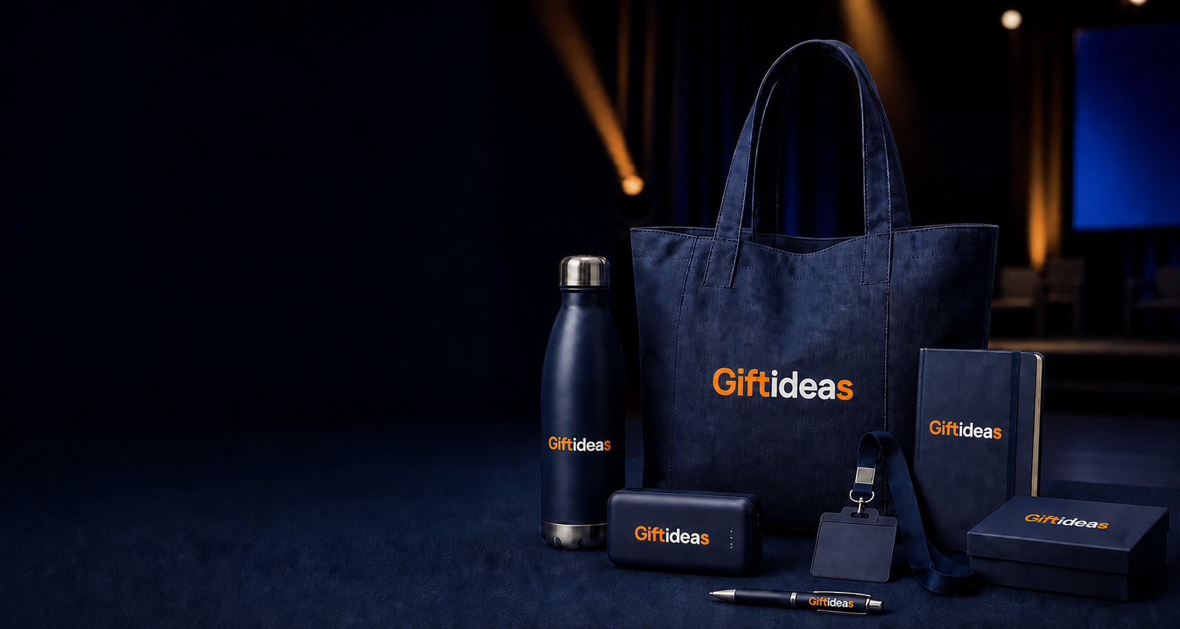 Giftideas corporate event merchandise collection in a premium navy and amber studio
