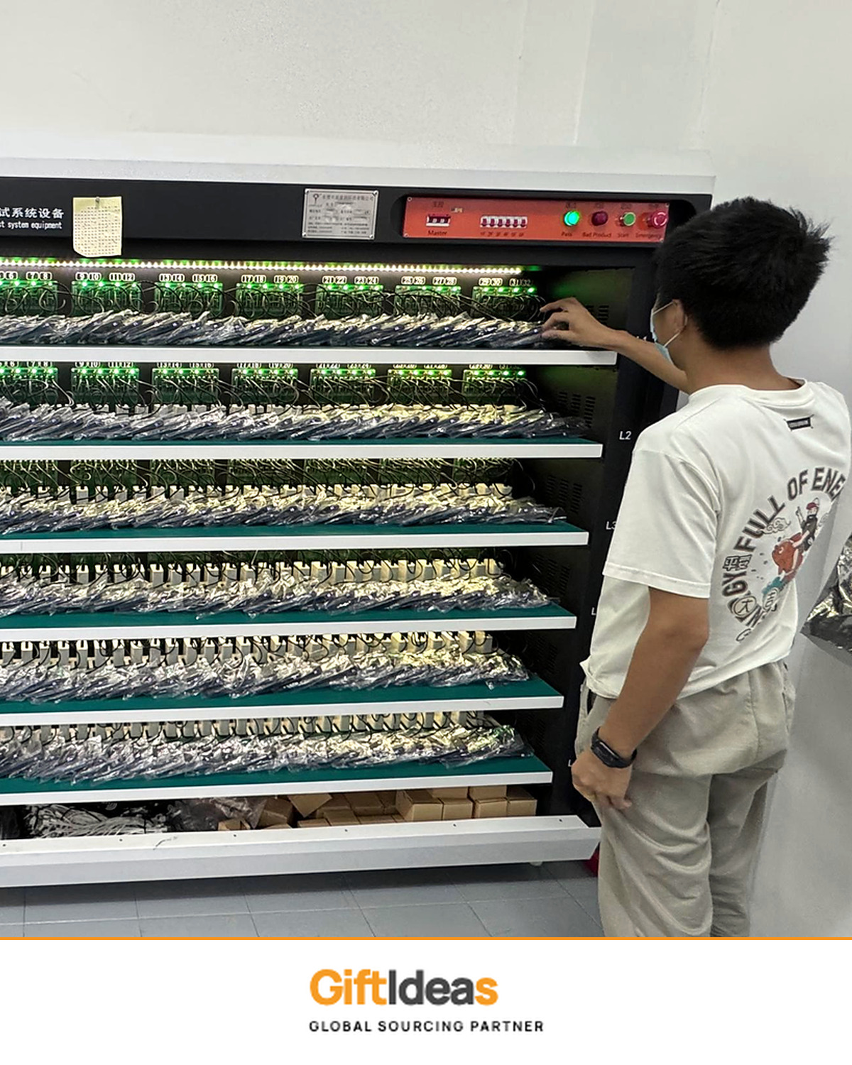 Operator beside digital aging test equipment